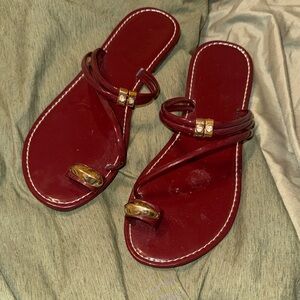 Elegant Red Sandals with Gold Accents
